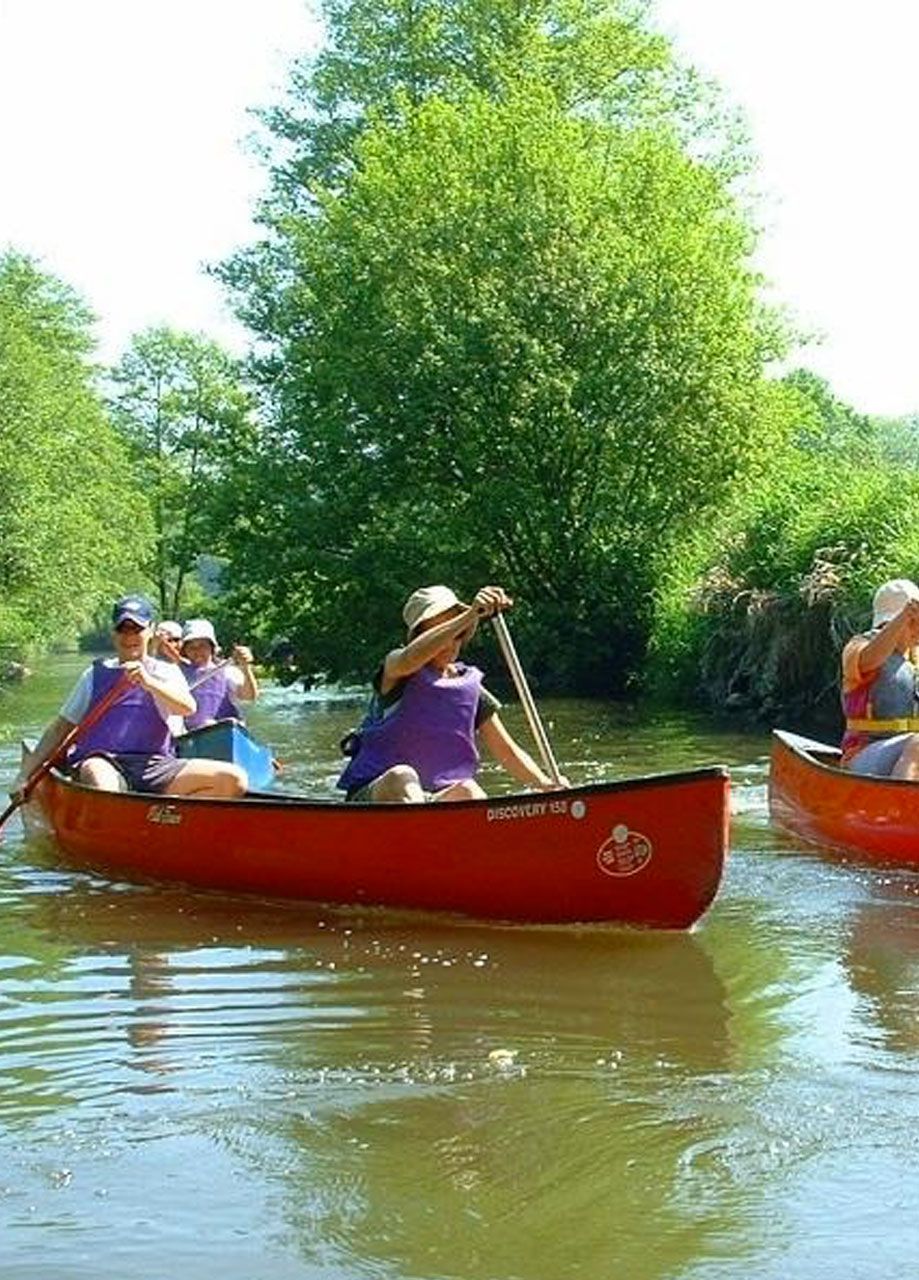 navigate the river in a canoe